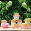 Cherry-Blossom-600x525-product-lettering Cherry Blossom scent line with alphanumeric notation for each product.